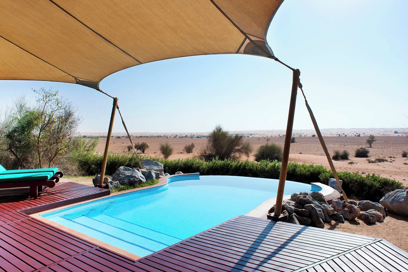Private pool villa terrace overlooking the desert at Al Maha